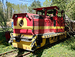 Schöma CFL180 DCL č.4 se soupravou vozů